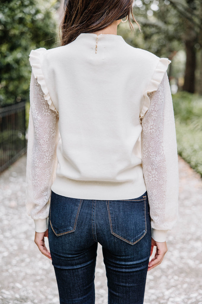 White sweater with outlet lace sleeves