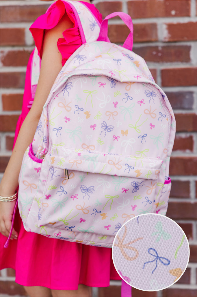 Girls: The Annette Pink Bow Print Backpack – Shop the Mint display picture 1