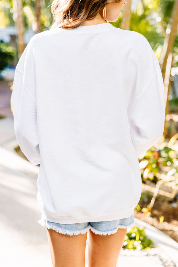 white embroidered sweatshirt