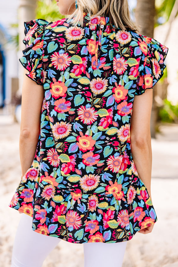 bright floral blouse