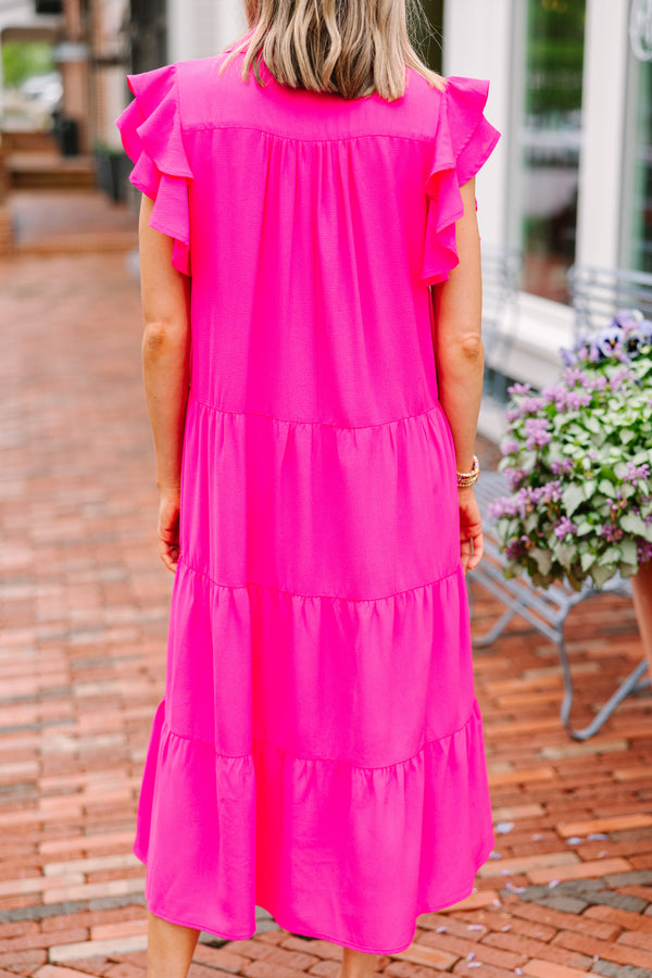 Pink tiered midi dress Ruffled sleeves Collared neckline Versatile fashion piece Ideal for formal and casual occasions.