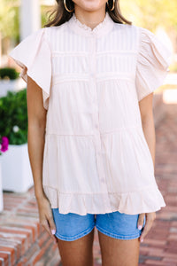 Conservative button-down blouse Fluttering short sleeves Tiered body Perfect for work or church Statement of elegance