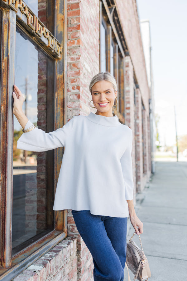 Light blue mock neck top on sale