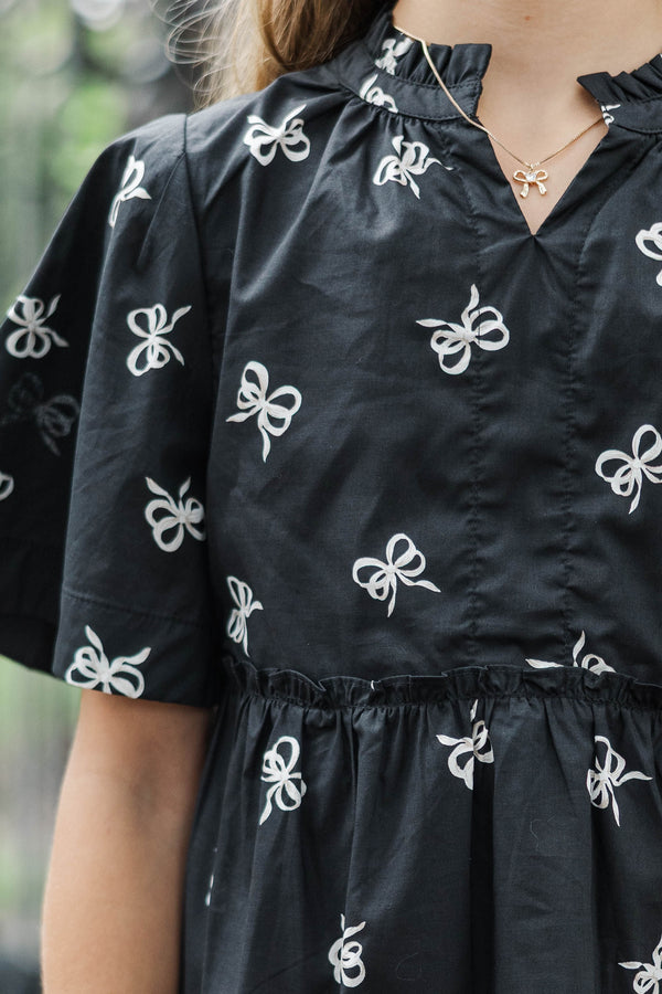 Girls: The Stephanie Black Bow Pattern Babydoll Dress