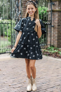 Girls: The Stephanie Black Bow Pattern Babydoll Dress