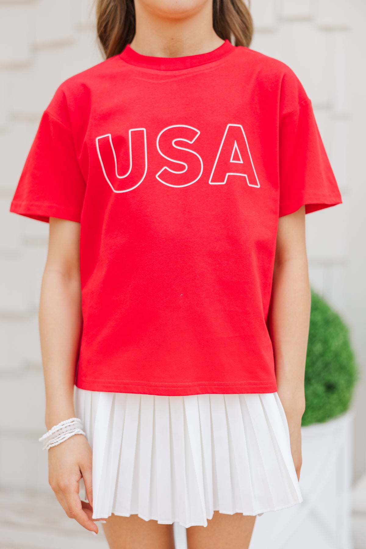 This Red Graphic Tee Is Hiding More Than Just Fashion—Here’s What Makes It Unbeatable