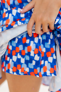 Girls: Take The Leap Orange and Blue Watercolor Satin Skort