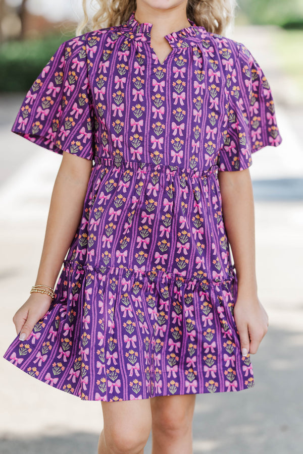 Girls: The Stephanie Plum Purple Bow Print Babydoll Dress
