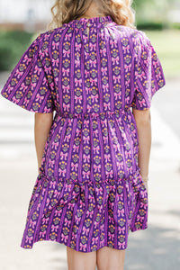 Girls: The Stephanie Plum Purple Bow Print Babydoll Dress