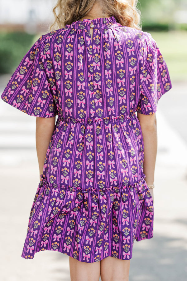 Girls: The Stephanie Plum Purple Bow Print Babydoll Dress