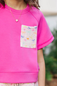 Girls: Casually Cute Pink Bow Print Pocket Tee