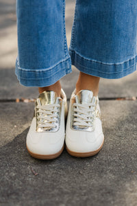 Take A Guess Gold Sneakers