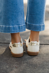 Take A Guess Gold Sneakers