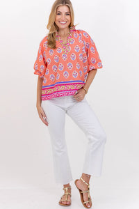 An Easy Yes Coral Floral Blouse