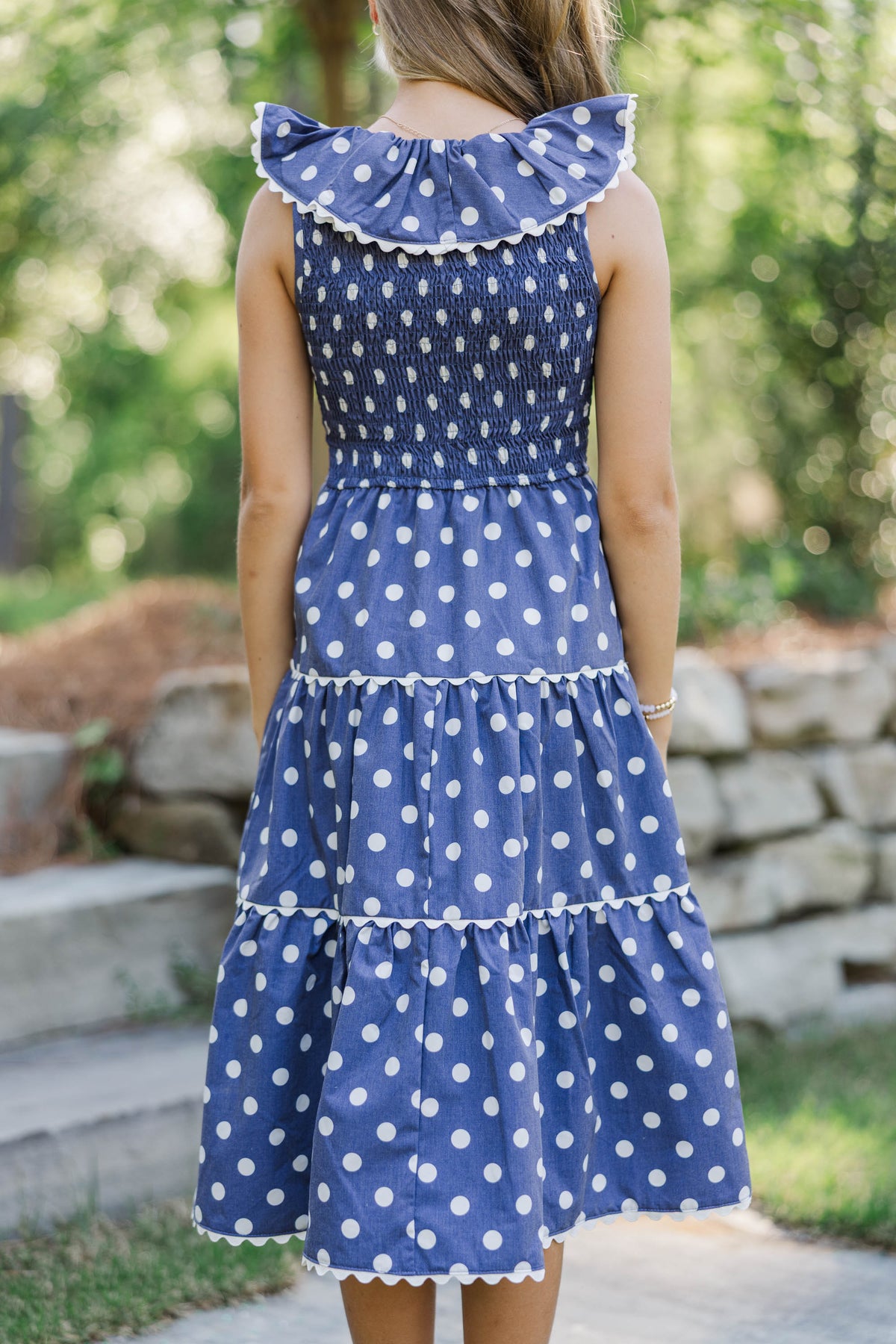the navy round neck polka dot cutout midi dress Girls: Long Time No See Navy Polka Dot Midi Dress, (12/14) - The Mint Julep Boutique
