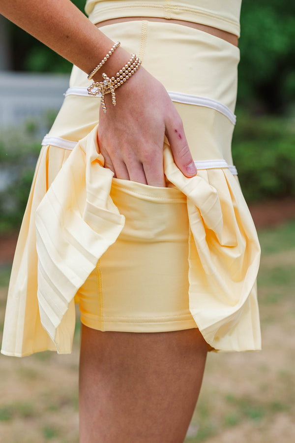 Girls: Court Side Yellow And White Trim Skort