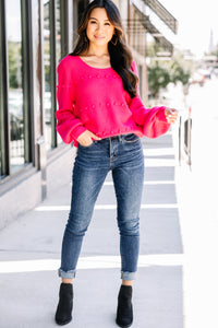 bright pink pompom sweater