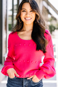 bright pink pompom sweater