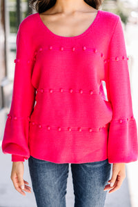 bright pink pompom sweater