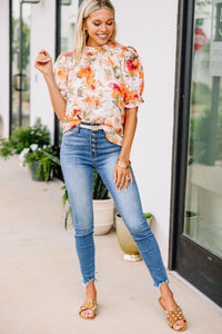 orange floral blouse