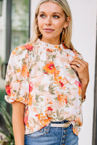 orange floral blouse