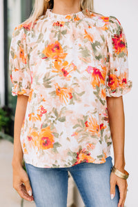 orange floral blouse