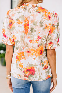 orange floral blouse