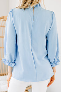 feminine blue blouse