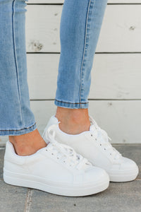 white sneakers