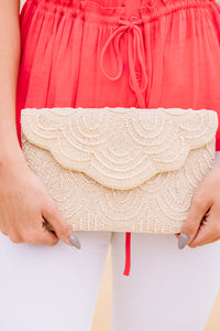 white beaded clutch