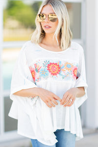 white floral embroidered top