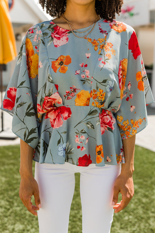 bold floral blouse