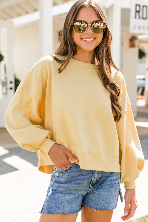 solid yellow pullover