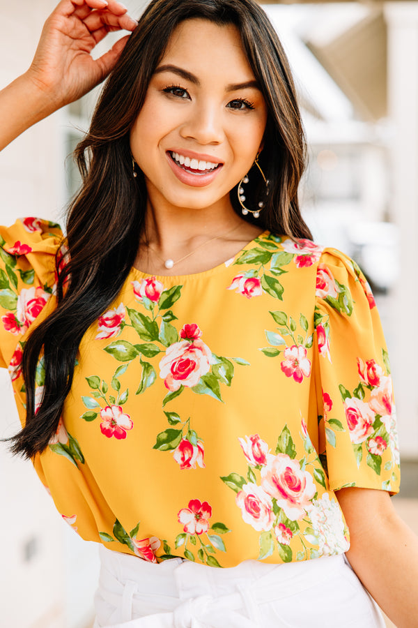 yellow floral blouse