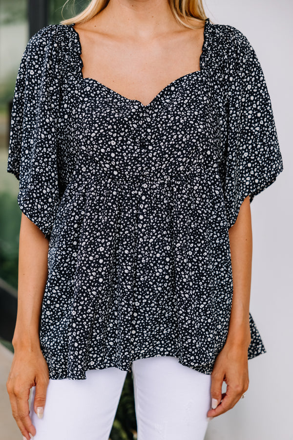 black spotted blouse