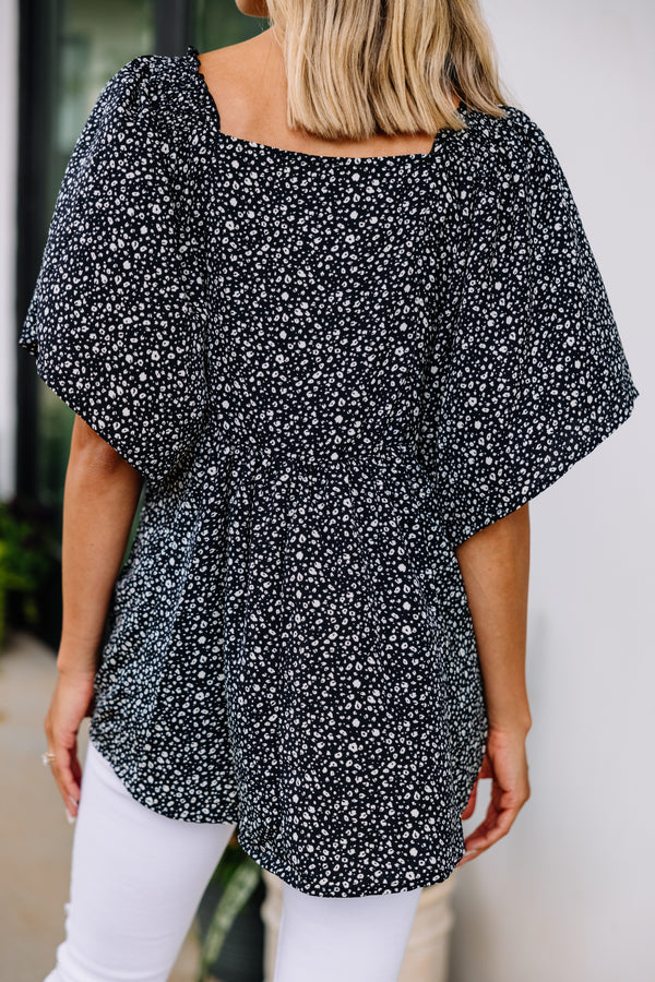 black spotted blouse