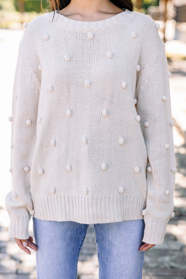 white pompom sweater