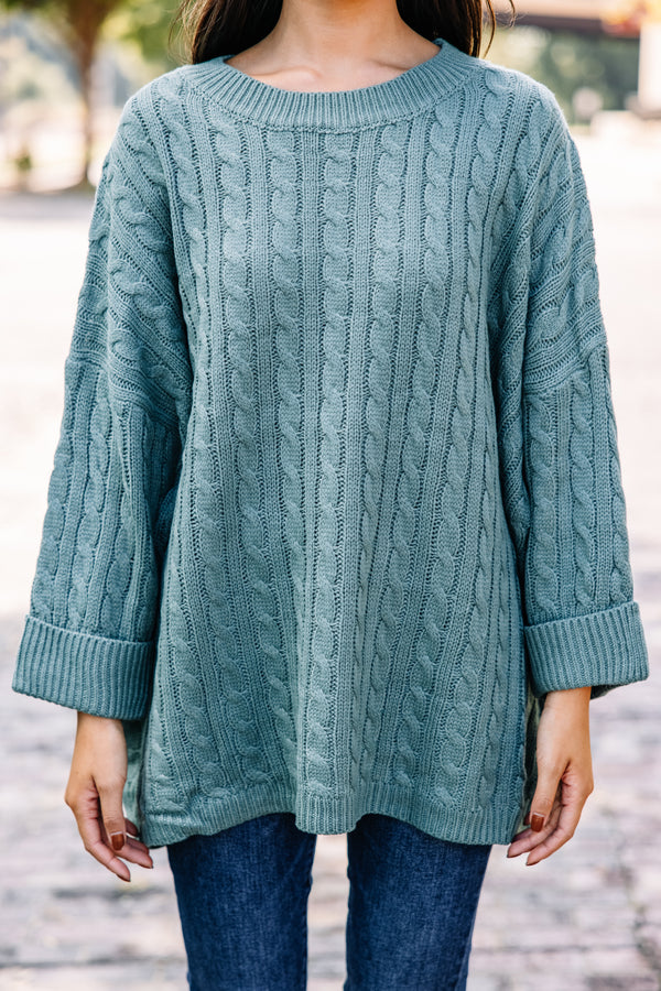 green cable knit sweater