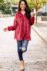 fuzzy red pullover