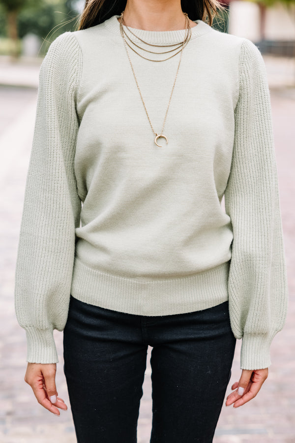 green ribbed sweater