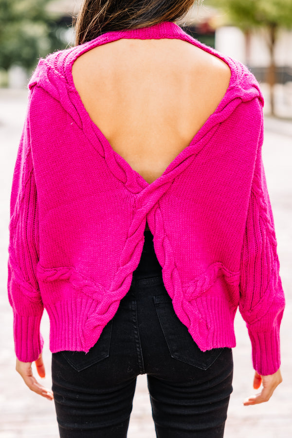 bright pink cable knit sweater