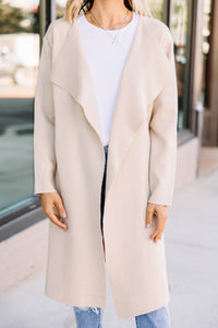 light taupe coat