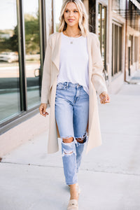 light taupe coat