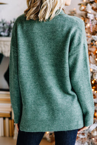 green solid sweater