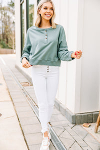 green cropped pullover