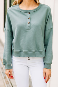 green cropped pullover