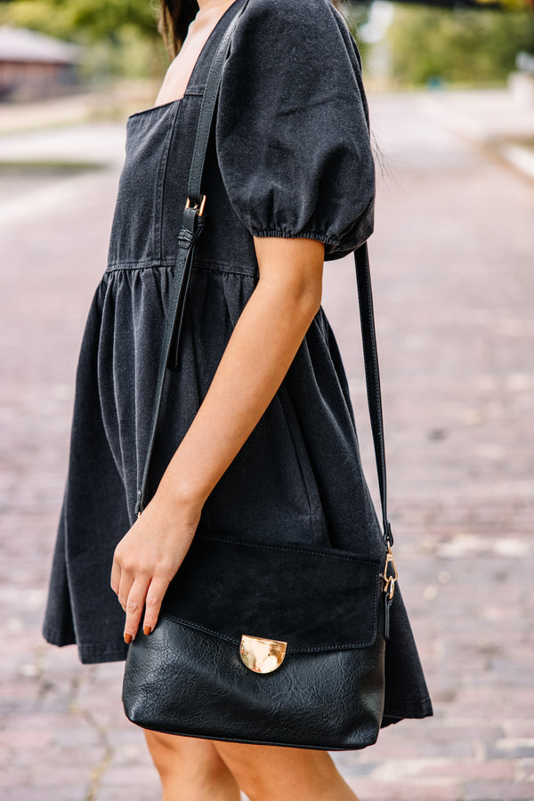 black faux leather purse