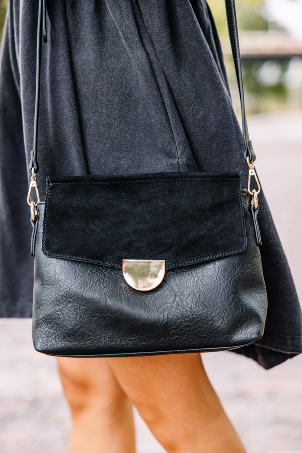 black faux leather purse