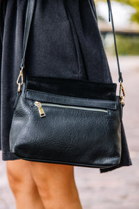 black faux leather purse
