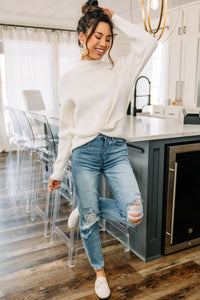 white mock neck sweater